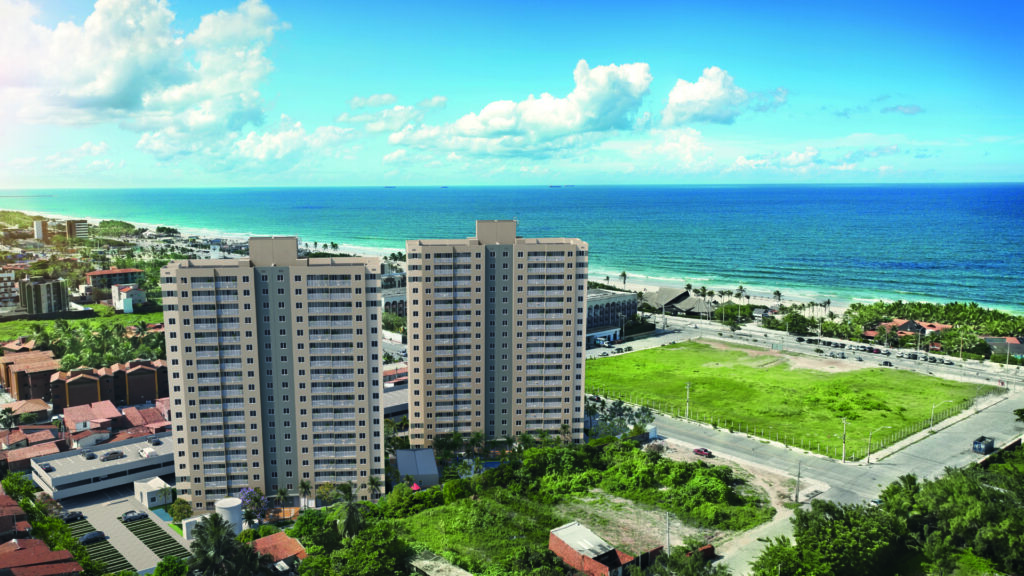 Taxa Selic: o que é e como influencia a compra da casa própria Fachada do Estilo Praia, empreendimento em Fortaleza/CE, ótimo para investir com a taxa Selic em queda